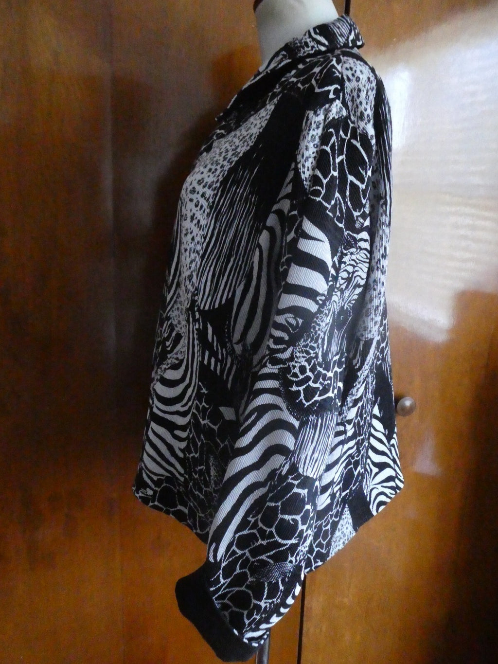 From Macys women's reversable black/white soft polyester blazer size 14 US