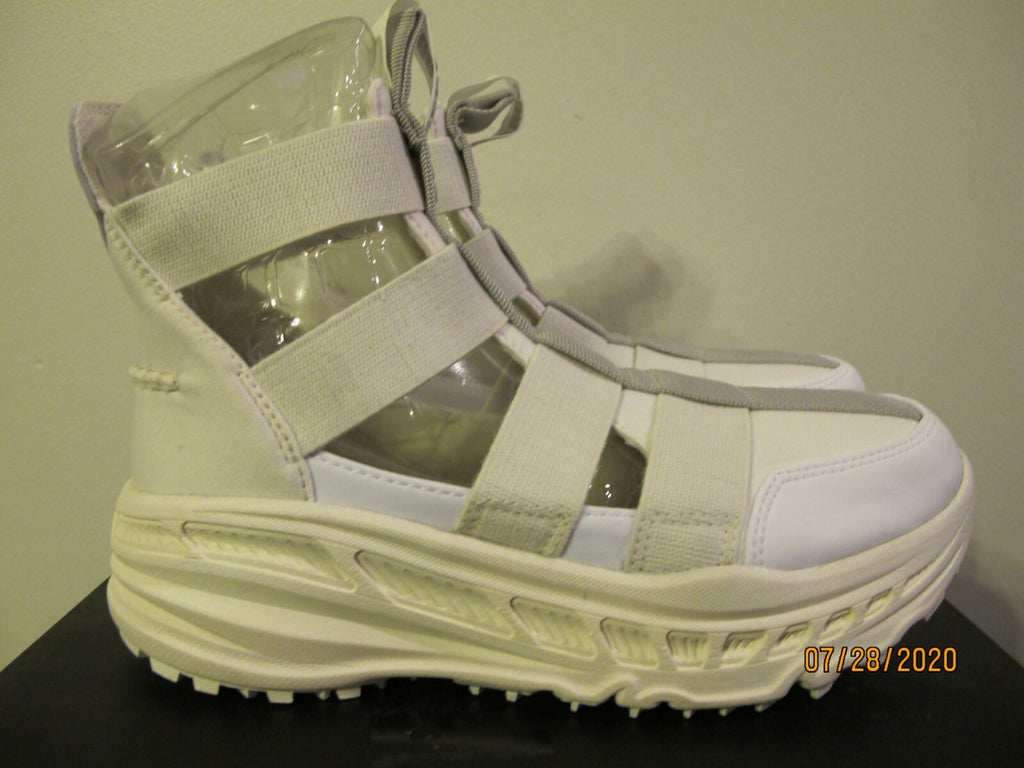 UGG women's white gladiator straps and a thick running-shoe size 8