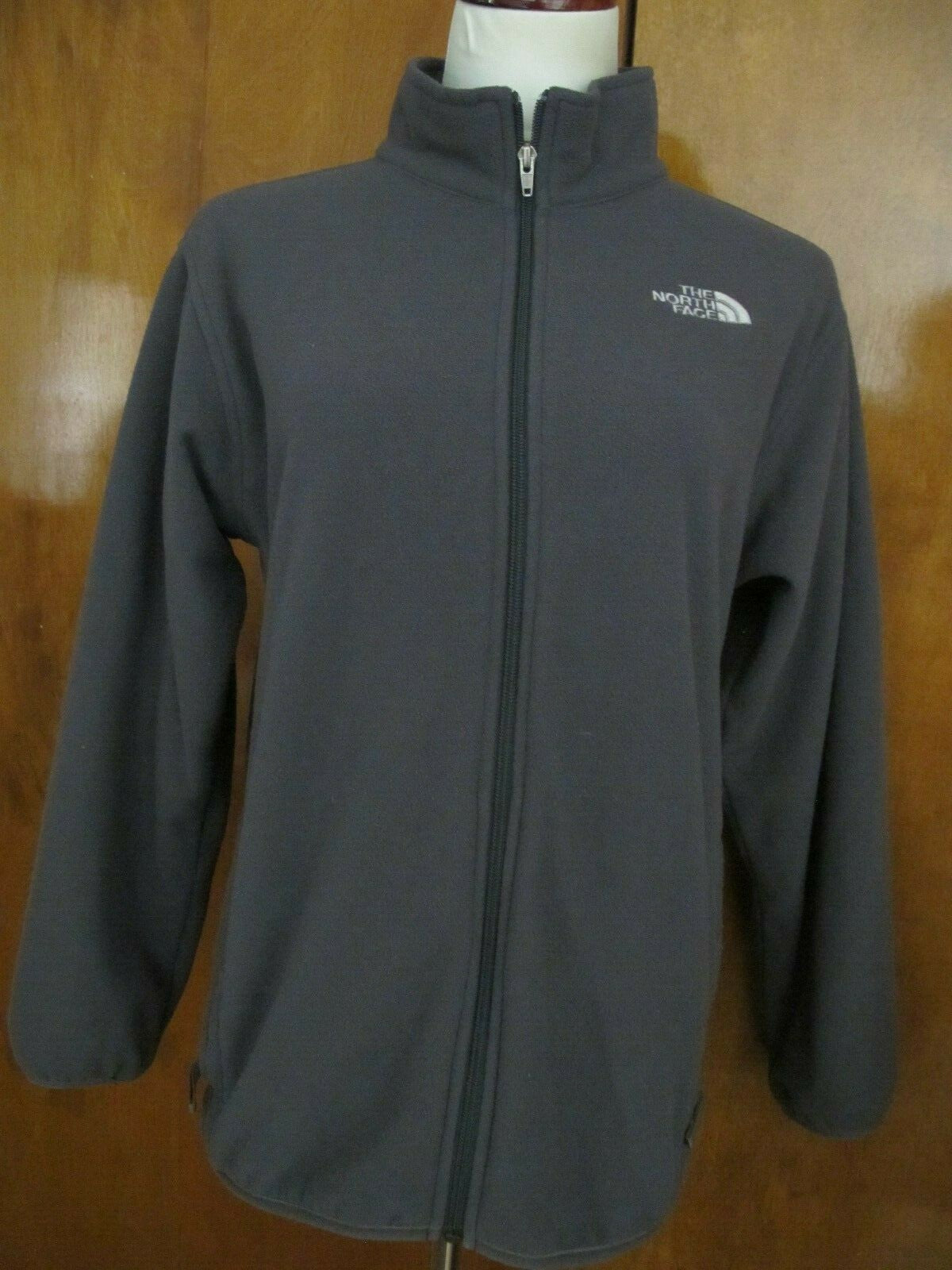 The North Face black boys XL zip out fleece jacket can be worn 2 different ways