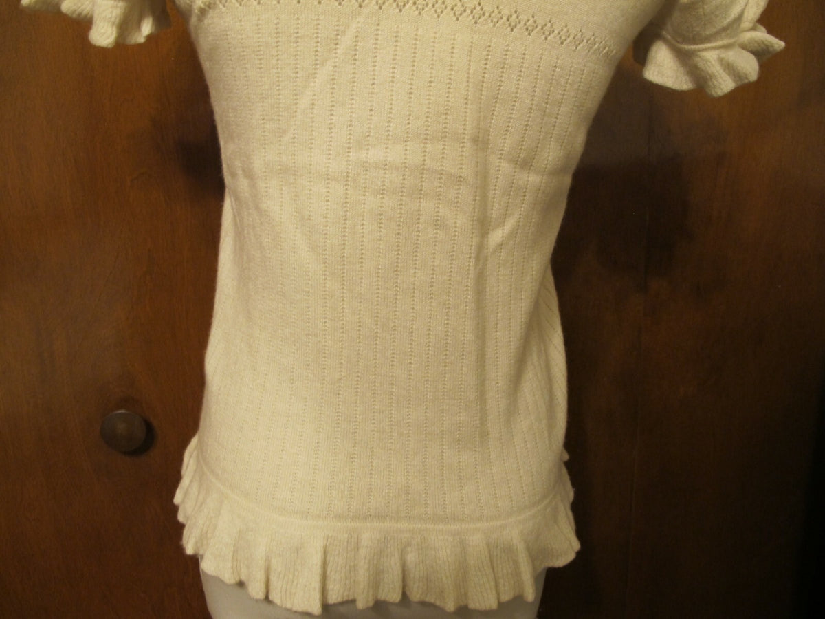 Juicy Couture women's sweater top ivory size Medium fits Small pre-owned 