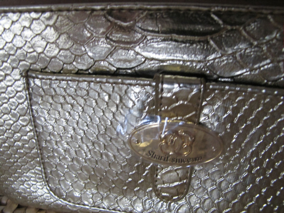 Sharif Since 1827 Gold Makeup Bag Wrist Strap