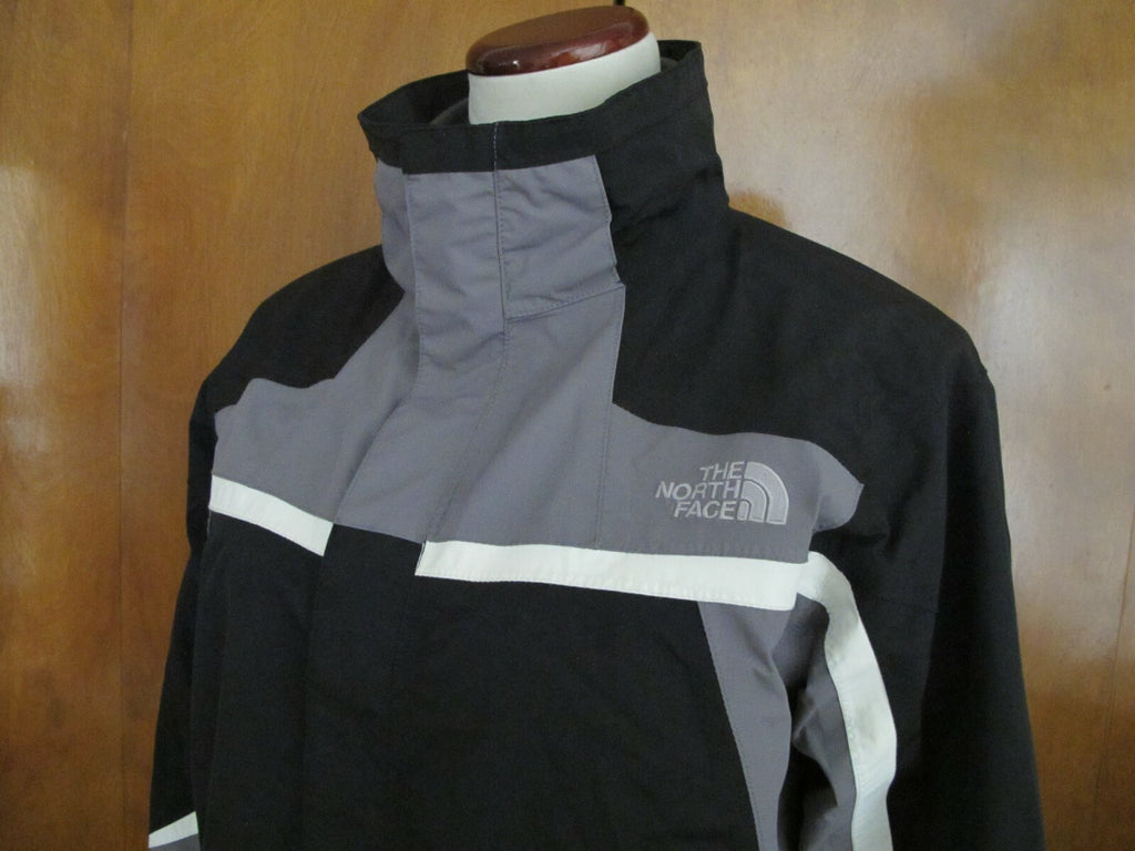 The North Face black boys XL zip out fleece jacket can be worn 2 different ways