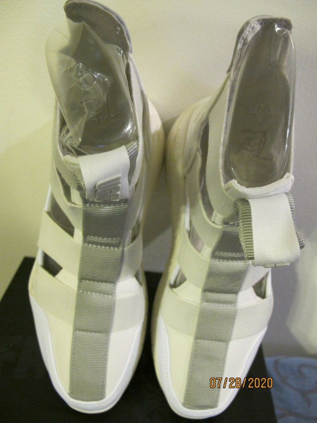 UGG women's white gladiator straps and a thick running-shoe size 8
