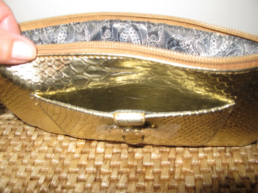 Sharif Since 1827 Gold Makeup Bag Wrist Strap