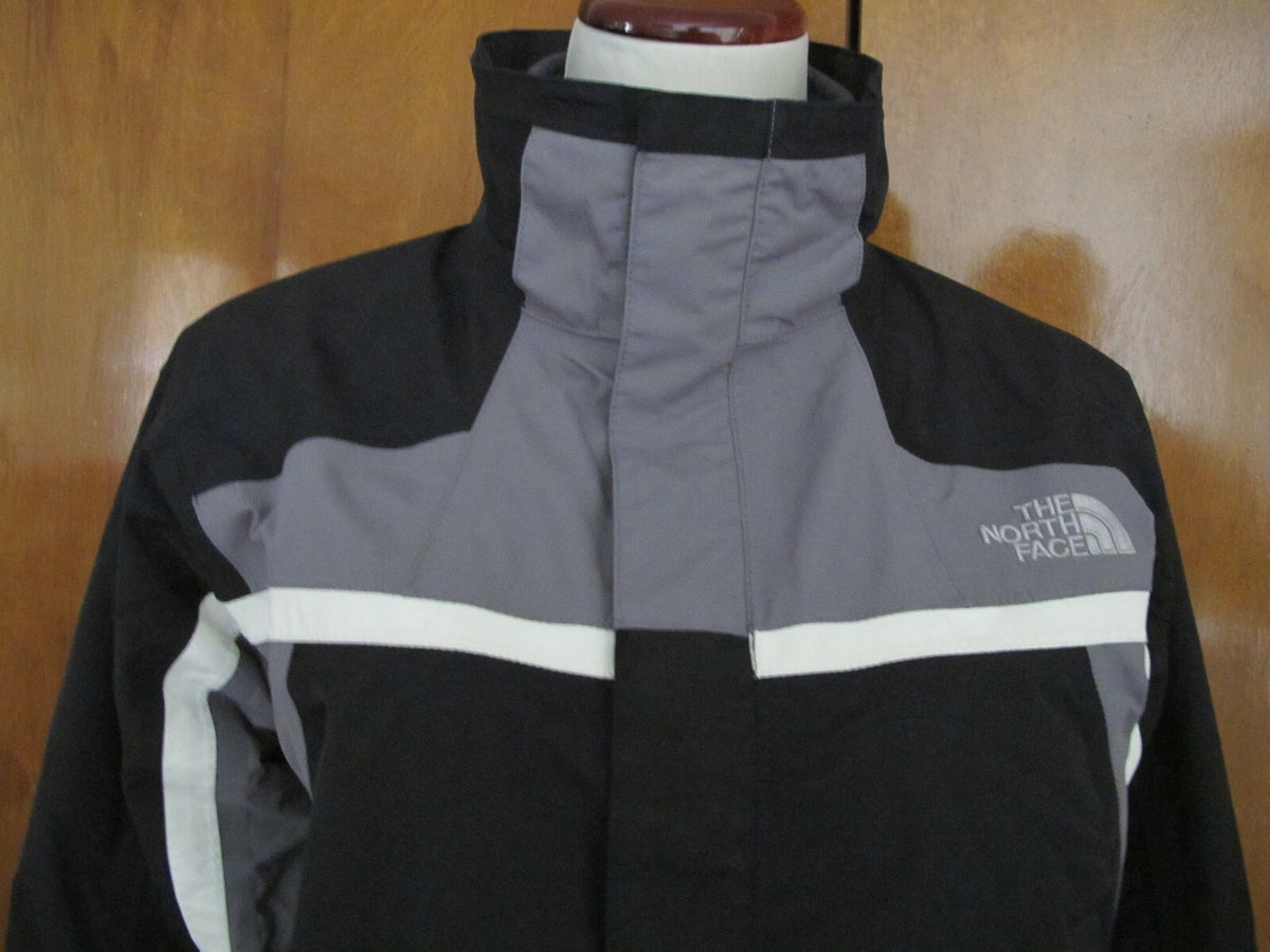 The North Face black boys XL zip out fleece jacket can be worn 2 different ways