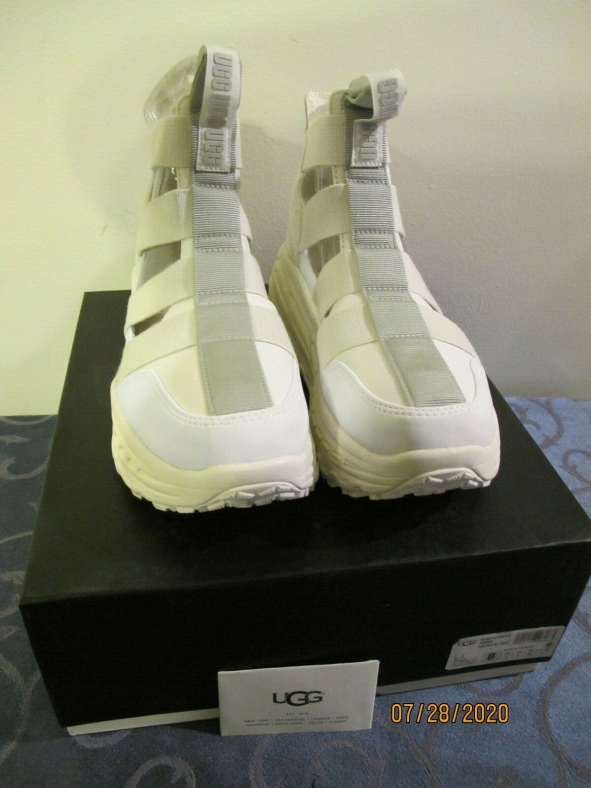 UGG women's white gladiator straps and a thick running-shoe size 8