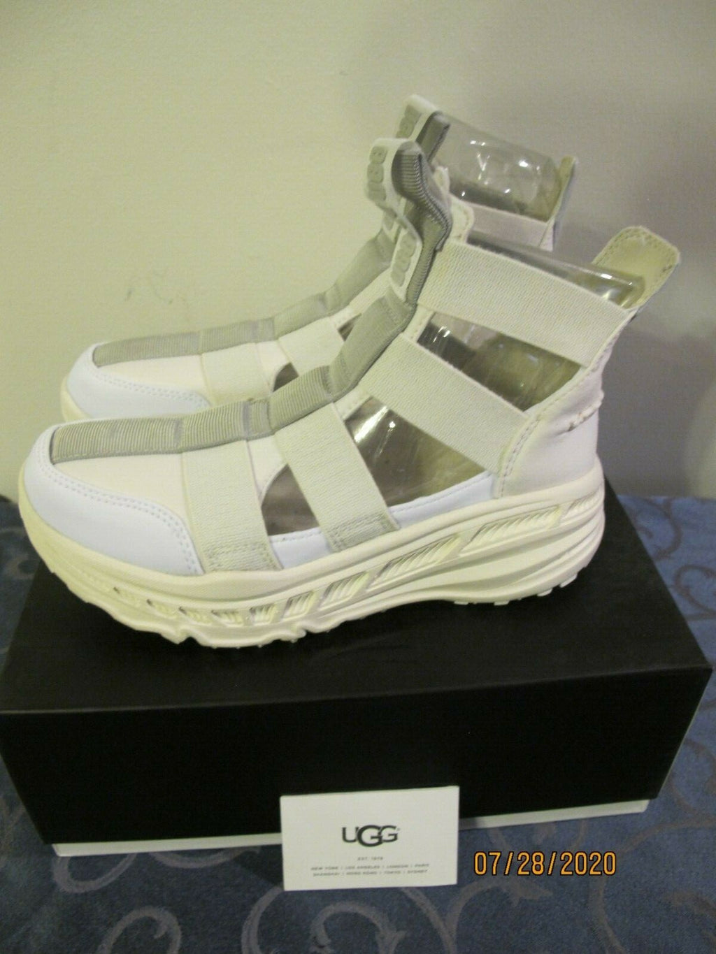 UGG women's white gladiator straps and a thick running-shoe size 8