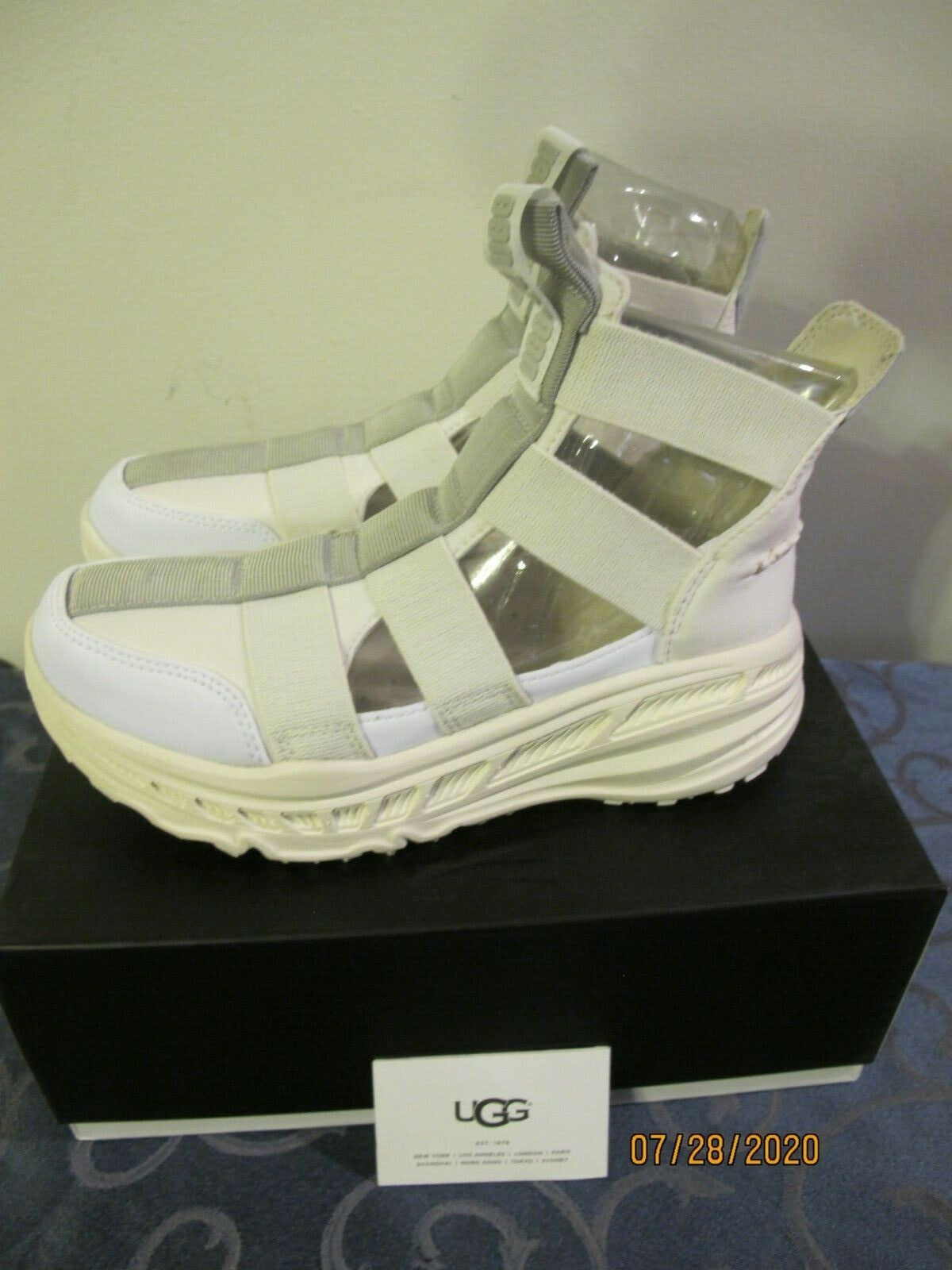UGG women's white gladiator straps and a thick running-shoe size 8