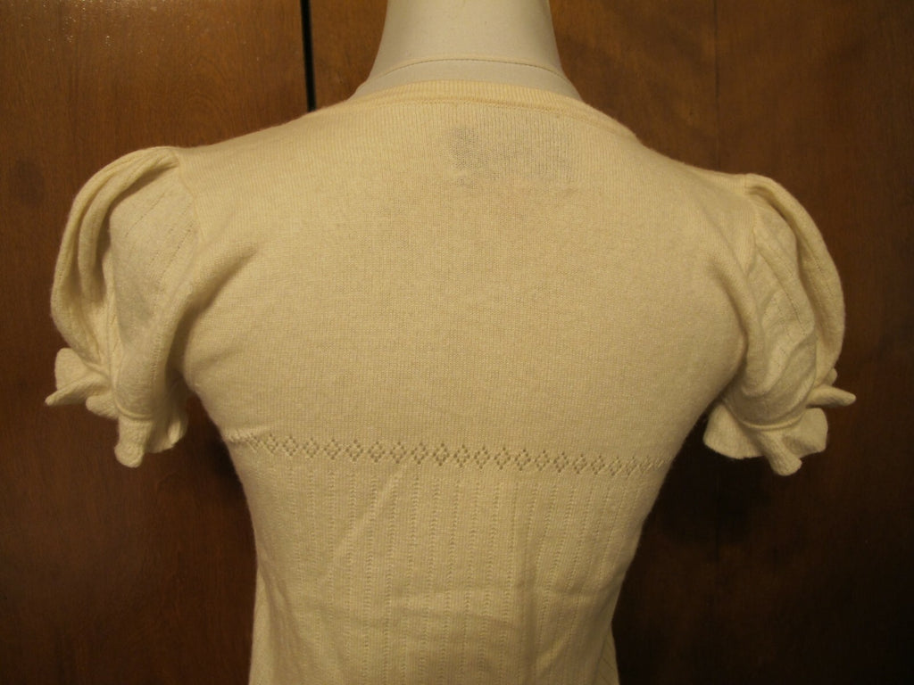Juicy Couture women's sweater top ivory size Medium fits Small pre-owned 