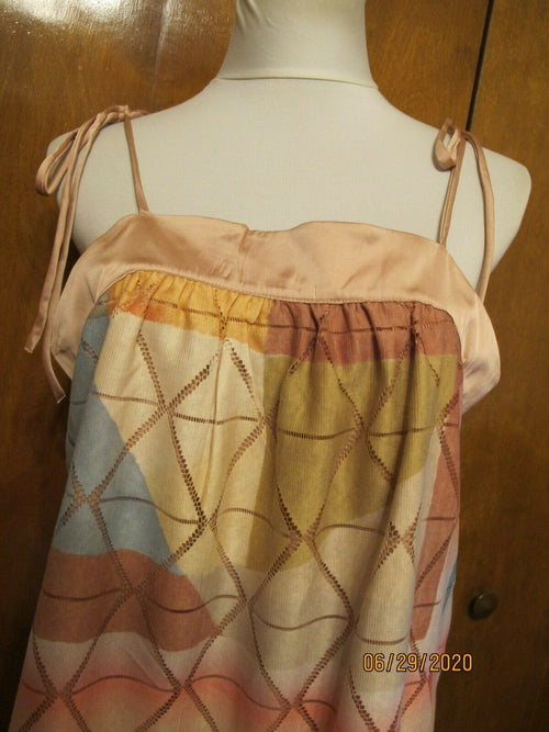 Anthropologie Akemi+ Kin women's lined multi color thank top.