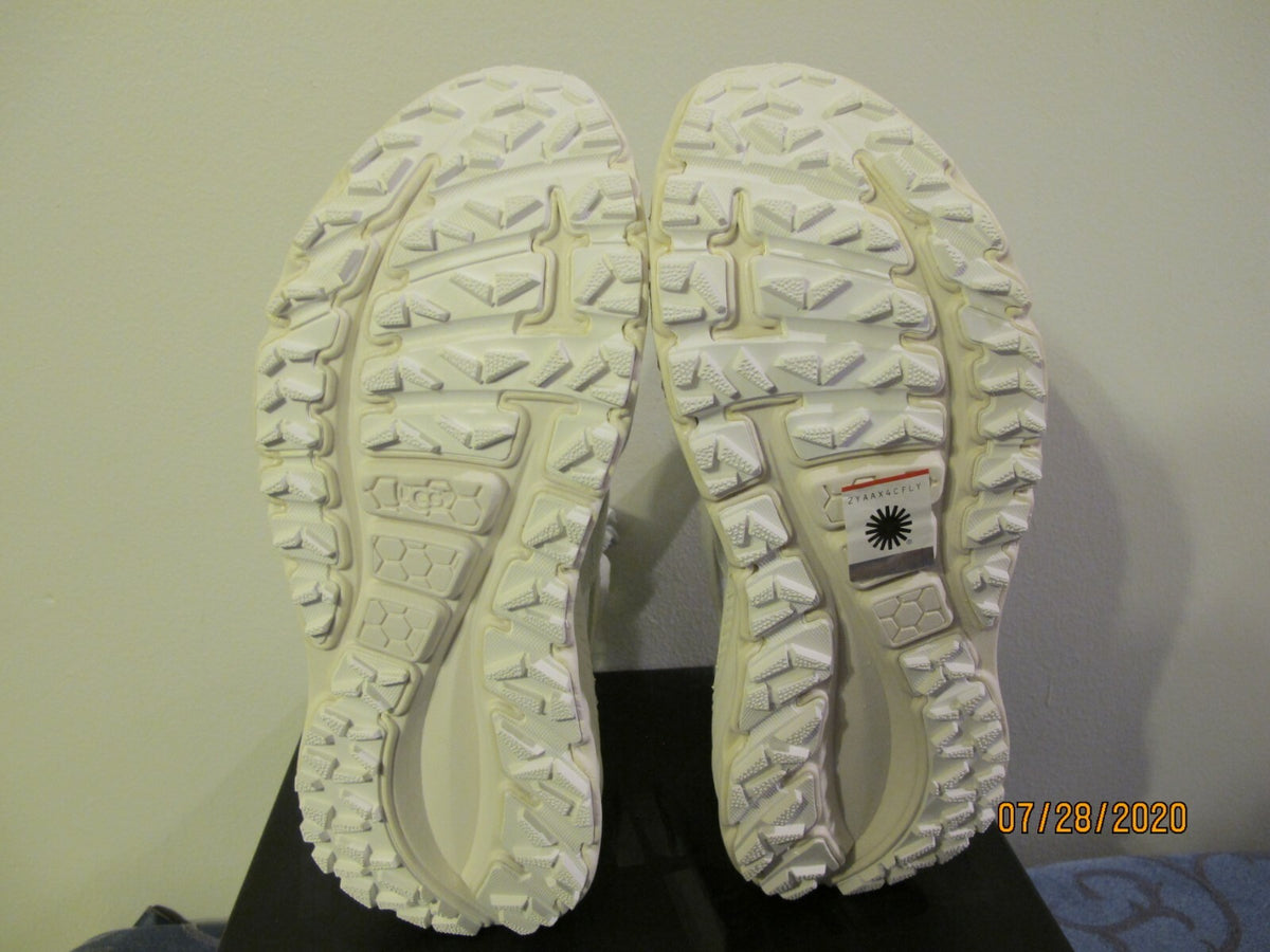 UGG women's white gladiator straps and a thick running-shoe size 8