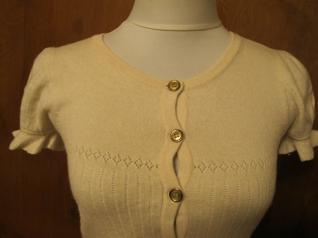 Juicy Couture women's sweater top ivory size Medium fits Small pre-owned 