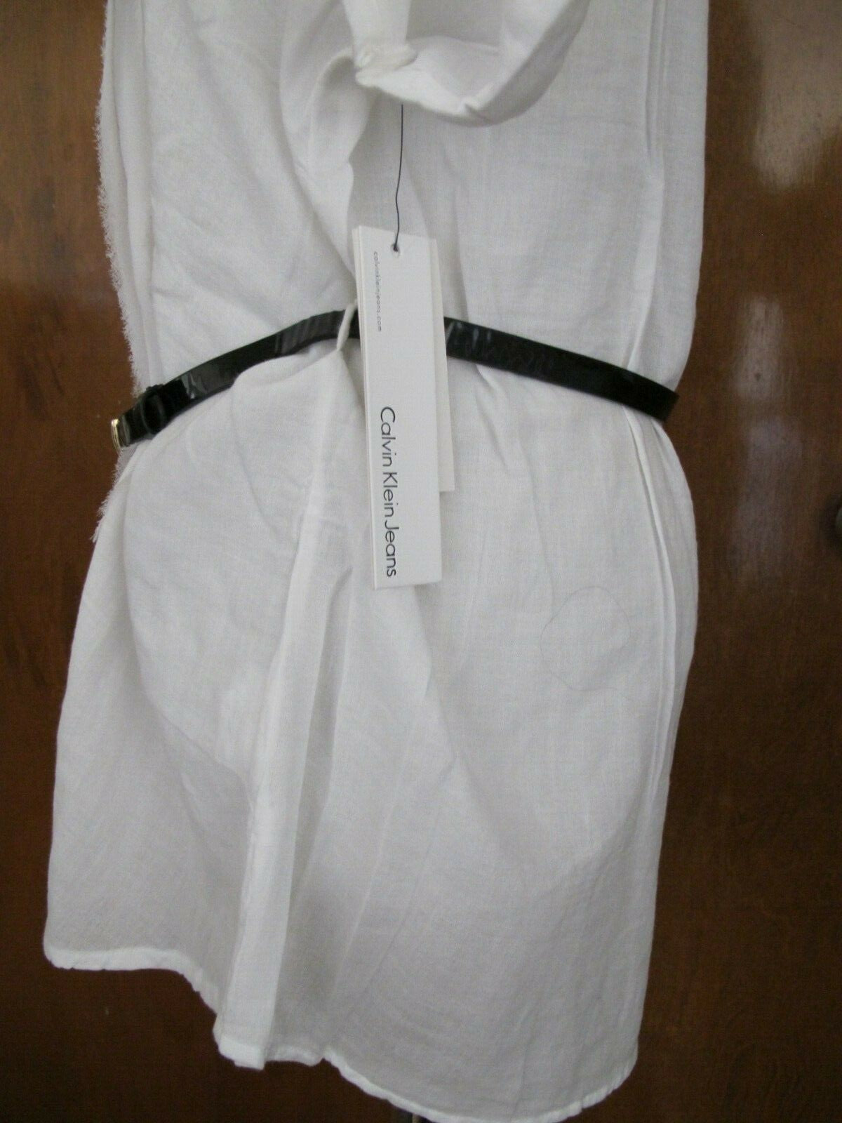New Calvin Klein Jeans women's white soft top Size PLarge can fit regular Large
