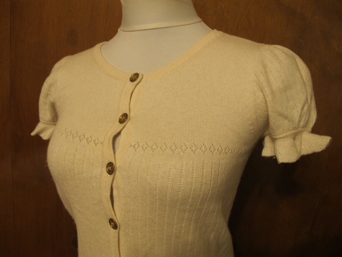 Juicy Couture women's sweater top ivory size Medium fits Small pre-owned 