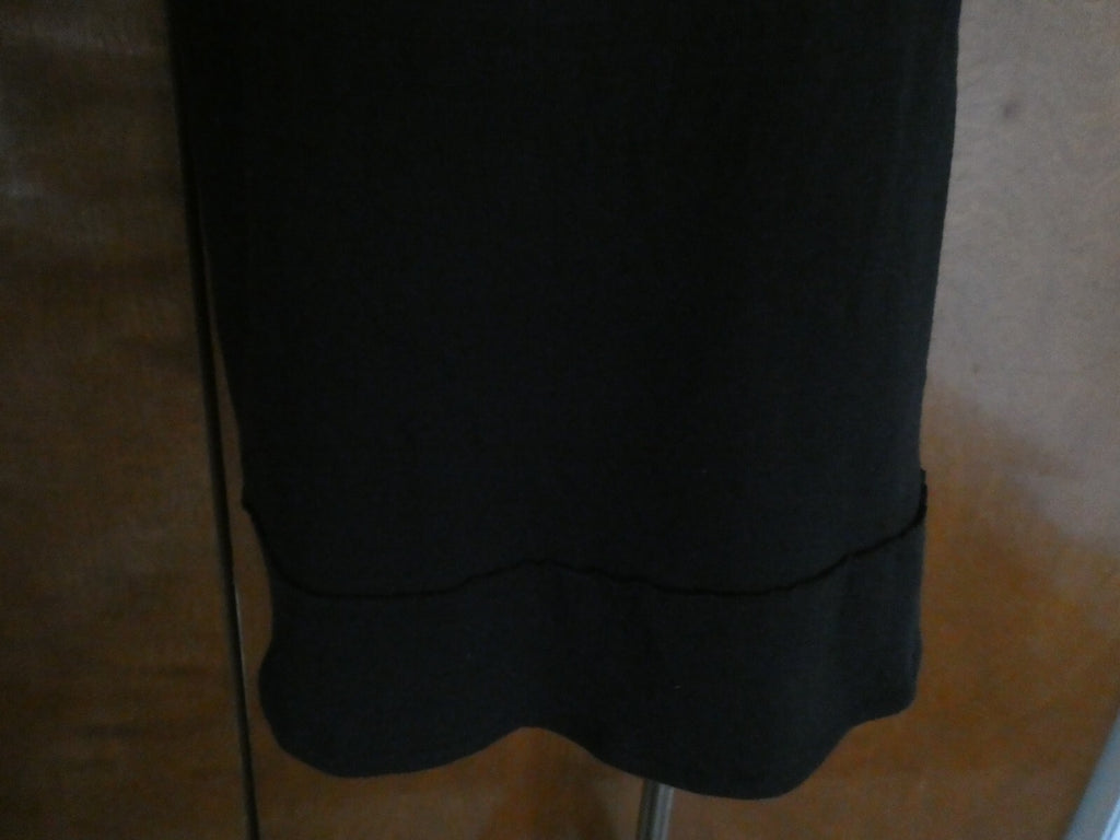 Free People women's black pullover 100% cotton strap top size Medium